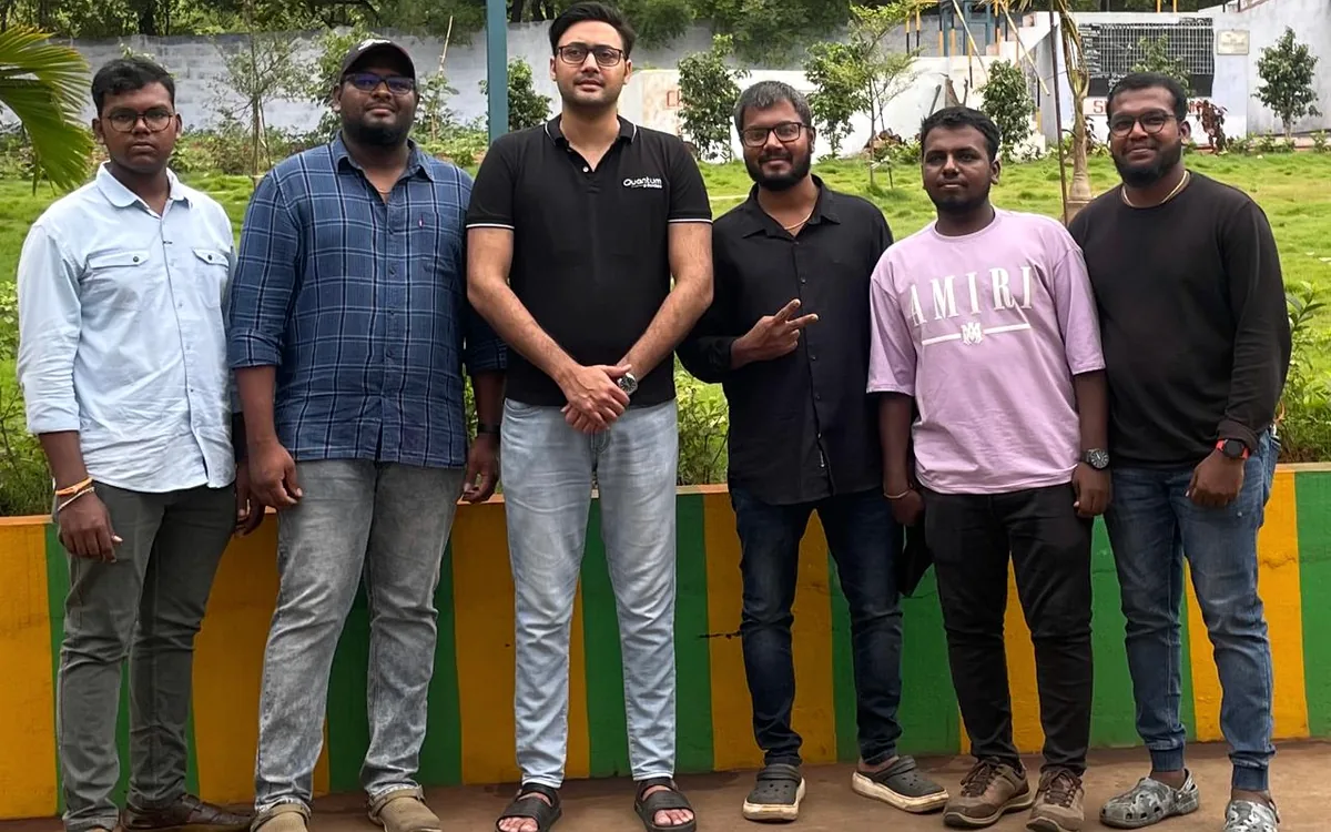 Madhiee with a business team during an outdoor collaboration session
